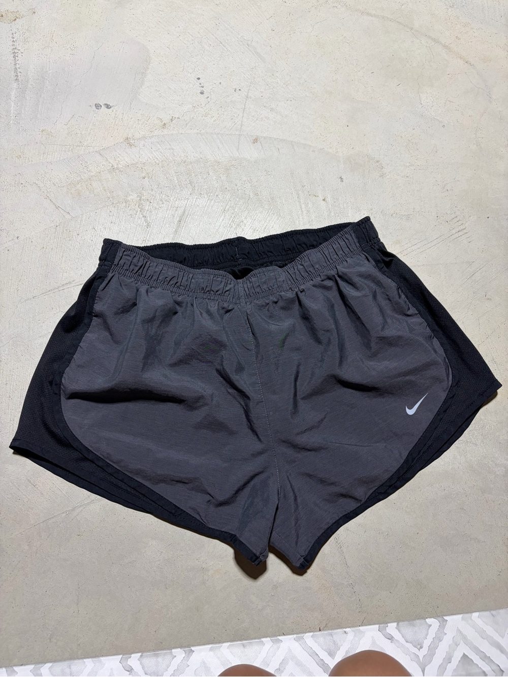 Nike Women’s charcoal and Black Running Shorts large